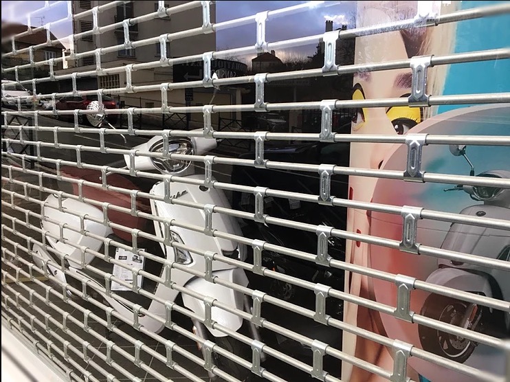 Grille aéro pour rideau métallique